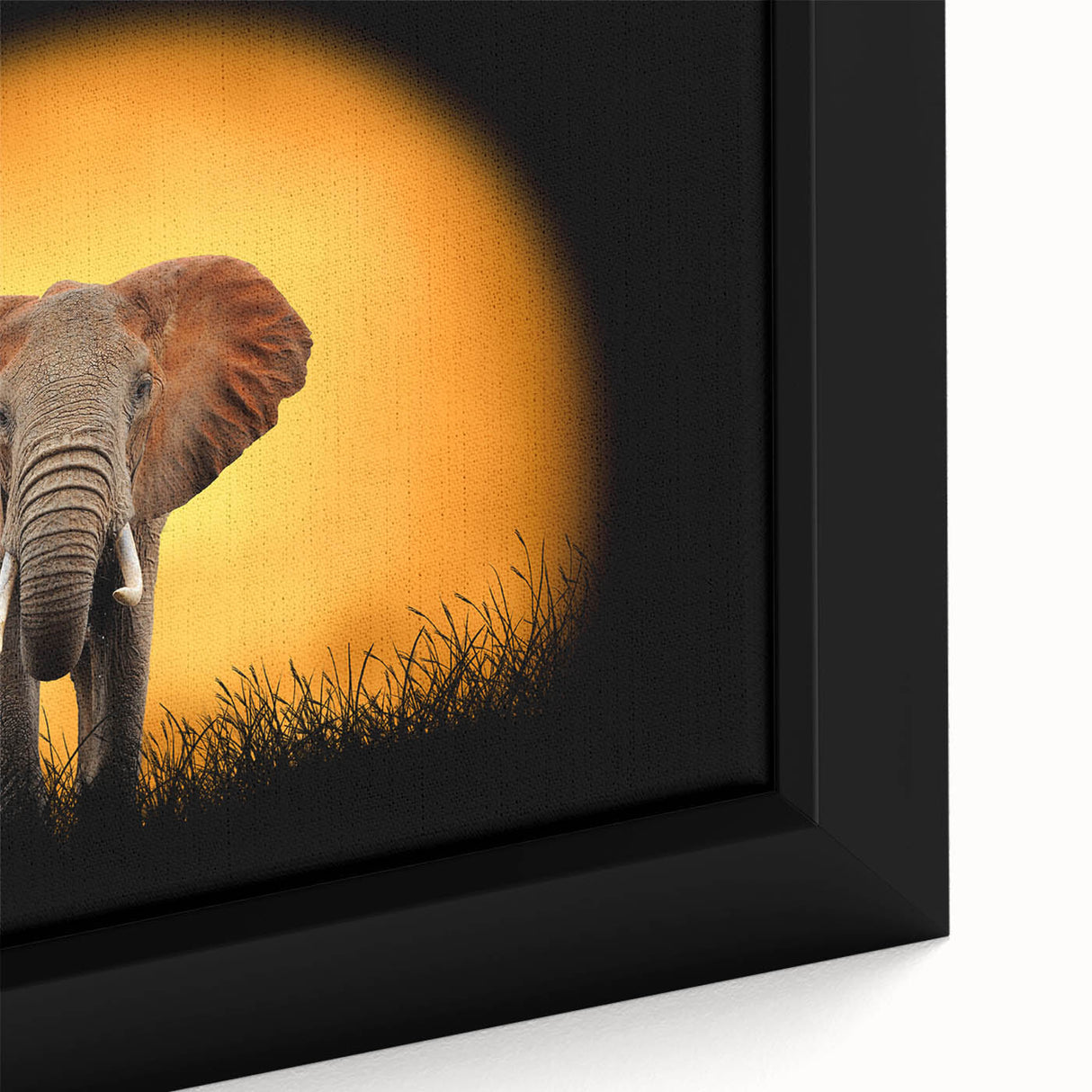 Close-up view of a framed canvas wall art featuring a vibrant elephant design in a natural setting, showcasing intricate details and bold colors, perfect for wildlife enthusiasts.