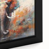 Close-up view of a beautifully framed canvas wall art depicting an African elephant design, showcasing intricate details and vibrant colors, perfect for wildlife enthusiasts.