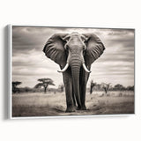 Framed canvas wall art depicting a majestic elephant in a minimalist white setting, showcasing intricate details and textures, perfect for wildlife enthusiasts and modern decor.