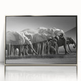 Framed wall art featuring a silver-accented design of an elephant in a natural setting, perfect for animal lovers and wildlife enthusiasts. Ideal for home decor.