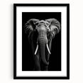 Framed wall art featuring a striking elephant design, showcasing intricate details and vibrant colors, set against a sleek black mat, ideal for wildlife enthusiasts.