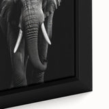Close-up view of a framed canvas wall art featuring a vibrant and detailed elephant design, showcasing intricate textures and colors, perfect for wildlife enthusiasts.