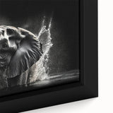 Close-up of a framed canvas wall art featuring a majestic elephant in a vibrant natural setting, showcasing intricate details and textures ideal for wildlife decor.