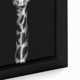 Close-up of a framed canvas wall art featuring a vibrant giraffe design, showcasing intricate details and textures that reflect the beauty of wildlife. Ideal for animal lovers and home decor enthusiasts, this piece adds a unique touch to any space.