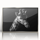 Framed wall art featuring a striking giraffe design in a sleek silver frame, showcasing vibrant colors and intricate details, perfect for wildlife enthusiasts' decor.