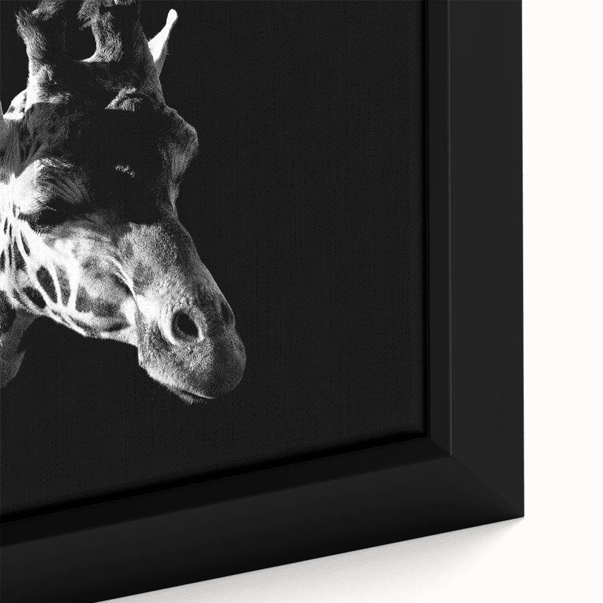 Close-up of a framed canvas wall art featuring a vibrant giraffe design, showcasing intricate details and textures, ideal for nature-themed home decor.