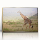 Framed wall art featuring a striking front view of a giraffe, showcasing intricate details and a gold-acrylic finish, perfect for animal lovers and modern decor.