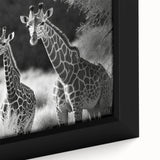 Close-up of a beautifully framed canvas wall art featuring a vibrant giraffe design in a natural setting, showcasing intricate details and rich colors, perfect for animal lovers and home decor enthusiasts.
