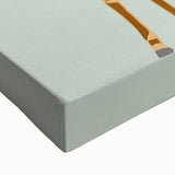 Close-up of a vibrant giraffe wall art canvas featuring intricate details and textures, perfect for adding a touch of wildlife elegance to any decor.