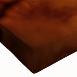 Close-up of a vibrant giraffe design on stretched canvas, showcasing intricate details of the animal's markings against a colorful backdrop, ideal for wildlife art enthusiasts.