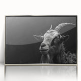 Framed wall art featuring a captivating goat design in a silver frame, showcasing vibrant colors and intricate details, perfect for animal lovers and modern decor.