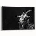 Framed wall art featuring a geometric goat design in a black color scheme, showcasing a modern aesthetic ideal for animal lovers and contemporary decor.