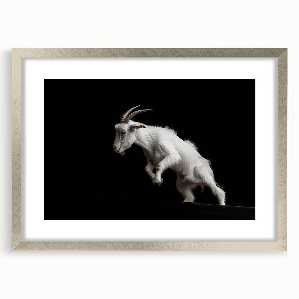 Framed wall art featuring a stylish goat design in a silver frame with a mat, perfect for animal lovers and home decor enthusiasts. Ideal for modern interiors.