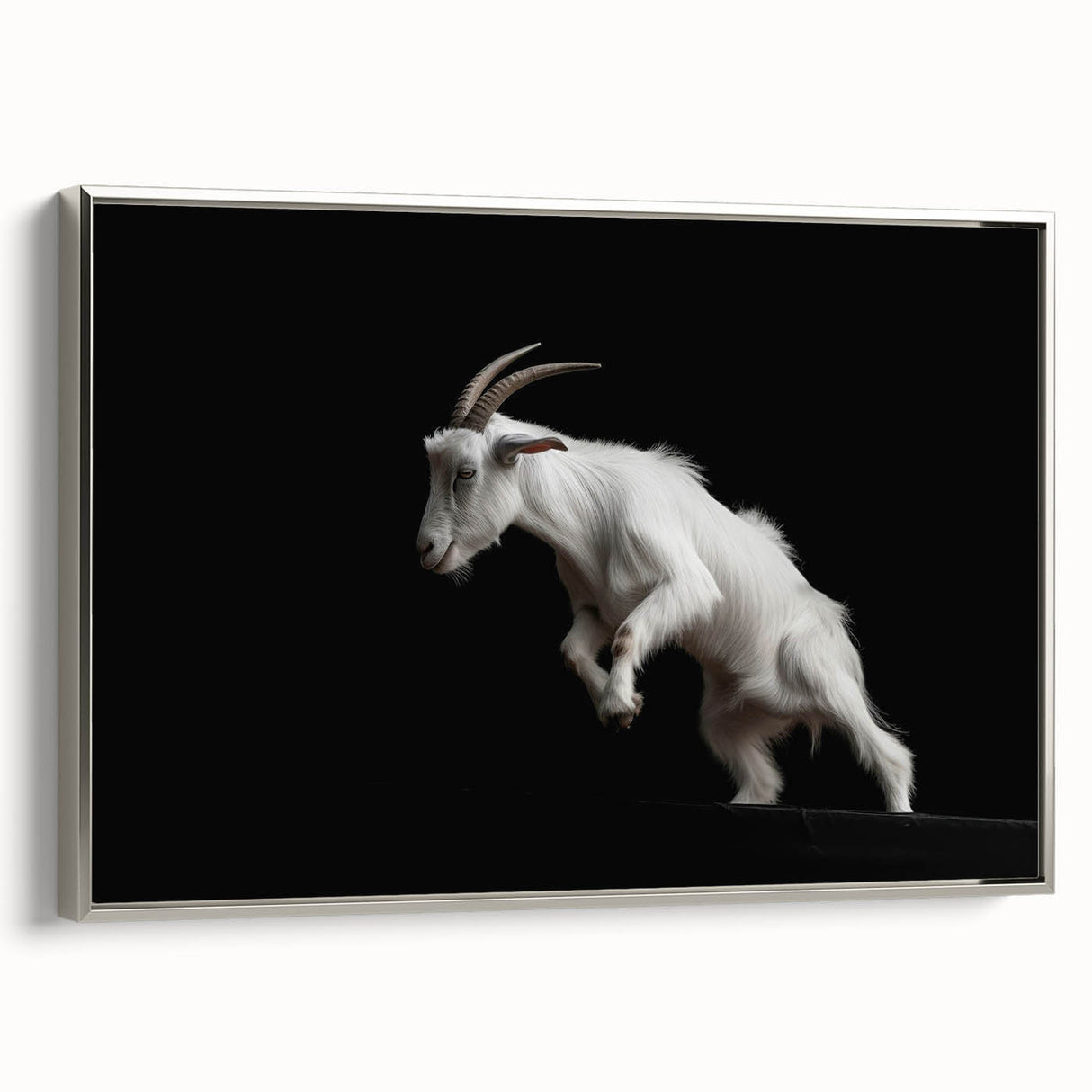 Framed wall art showcasing a silver side view of a majestic goat, part of the "Animals - A Wild Life" collection, designed to add elegance to any decor.