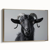Framed wall art featuring a stylized goat design in gold tones, set against a textured background, ideal for animal lovers and modern decor enthusiasts.