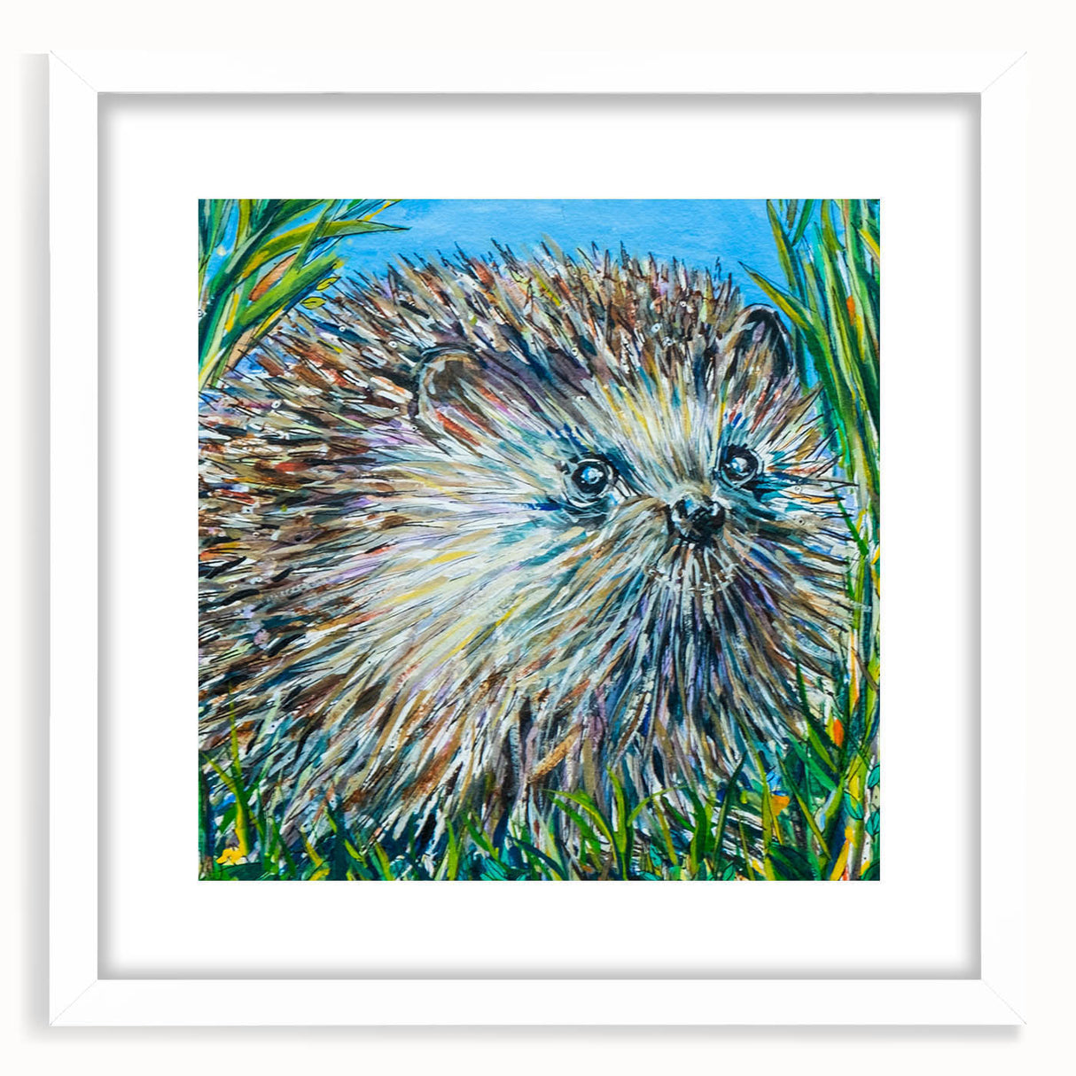 Hedgehog wall art print framed with a white mat, showcasing a whimsical design of a hedgehog in a natural setting, perfect for animal lovers’ decor.