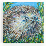 Hedgehog wall art design on stretched canvas, showcasing a vibrant, detailed illustration of a hedgehog surrounded by foliage, perfect for nature lovers.