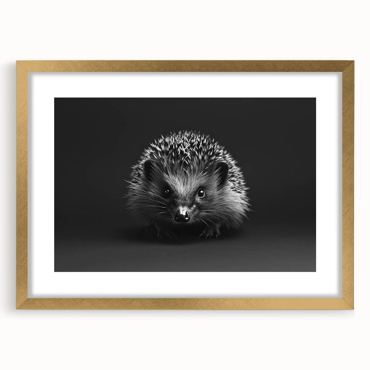 Framed wall art featuring a whimsical hedgehog design with a gold mat, perfect for adding a playful touch to children's rooms or nature-themed decor.