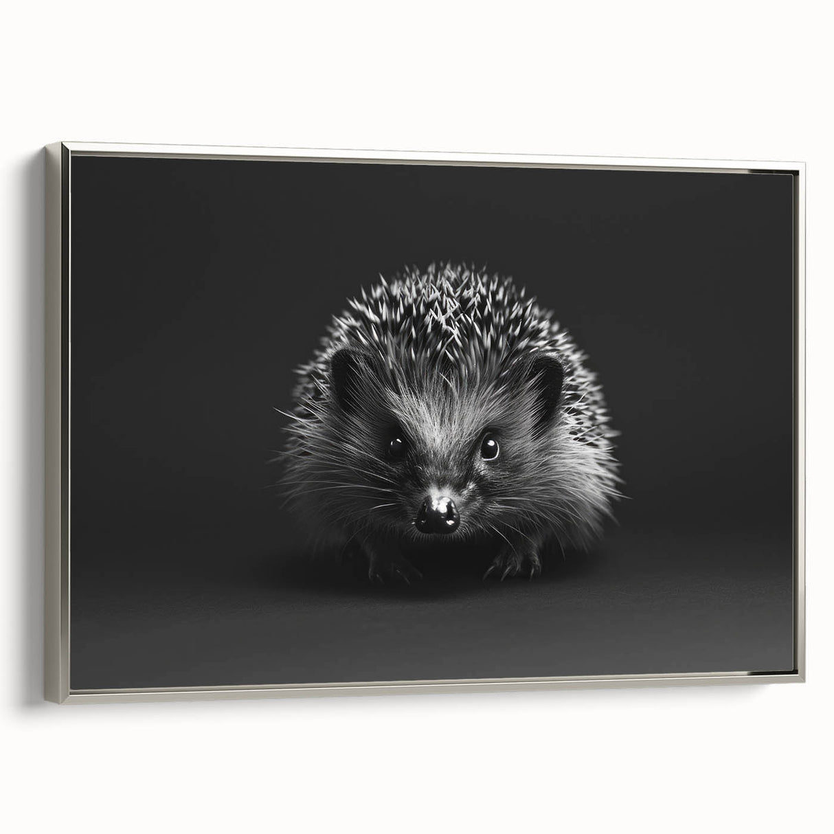 Framed wall art featuring a silver hedgehog design in profile view, showcasing intricate details and textures, ideal for animal-themed decor and modern interiors.