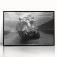 Framed wall art featuring a striking black and white illustration of a hippopotamus in a frontal view. The art piece showcases intricate details, perfect for animal lovers and unique home decor.