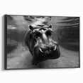 Framed wall art featuring a striking black side view of a hippopotamus, showcasing intricate details and textures, perfect for animal lovers and decor enthusiasts.