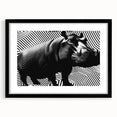 Black-framed wall art depicting a hippopotamus in a vibrant, colorful design, perfect for animal lovers and home decor enthusiasts. Ideal for adding a touch of wildlife elegance to any space.
