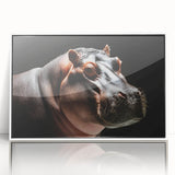 Framed wall art featuring a whimsical hippo design in vibrant colors, set against a white background, perfect for adding a playful touch to any room decor.