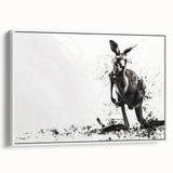 Framed wall art featuring a serene kangaroo design in a white frame, showcasing a side view of the animal in a natural setting, perfect for nature-themed decor.