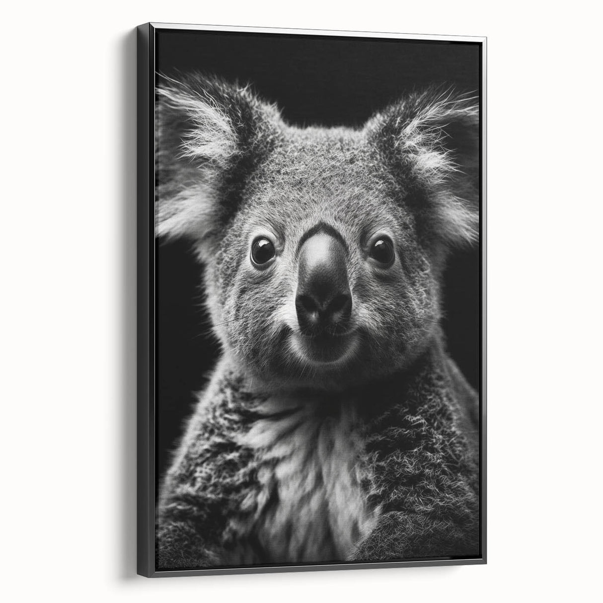 Framed canvas wall art showcasing a serene koala design against a black background, adding a touch of wildlife charm to modern decor. Perfect for animal lovers.