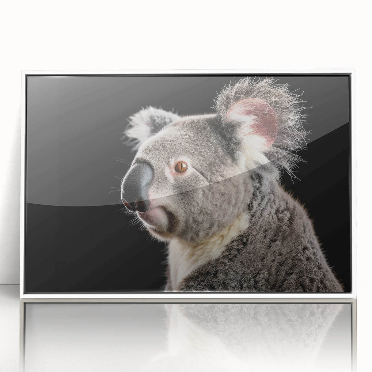 Framed wall art featuring a koala design in a serene forest setting, showcasing vibrant colors and detailed textures, perfect for animal lovers and home decor enthusiasts.