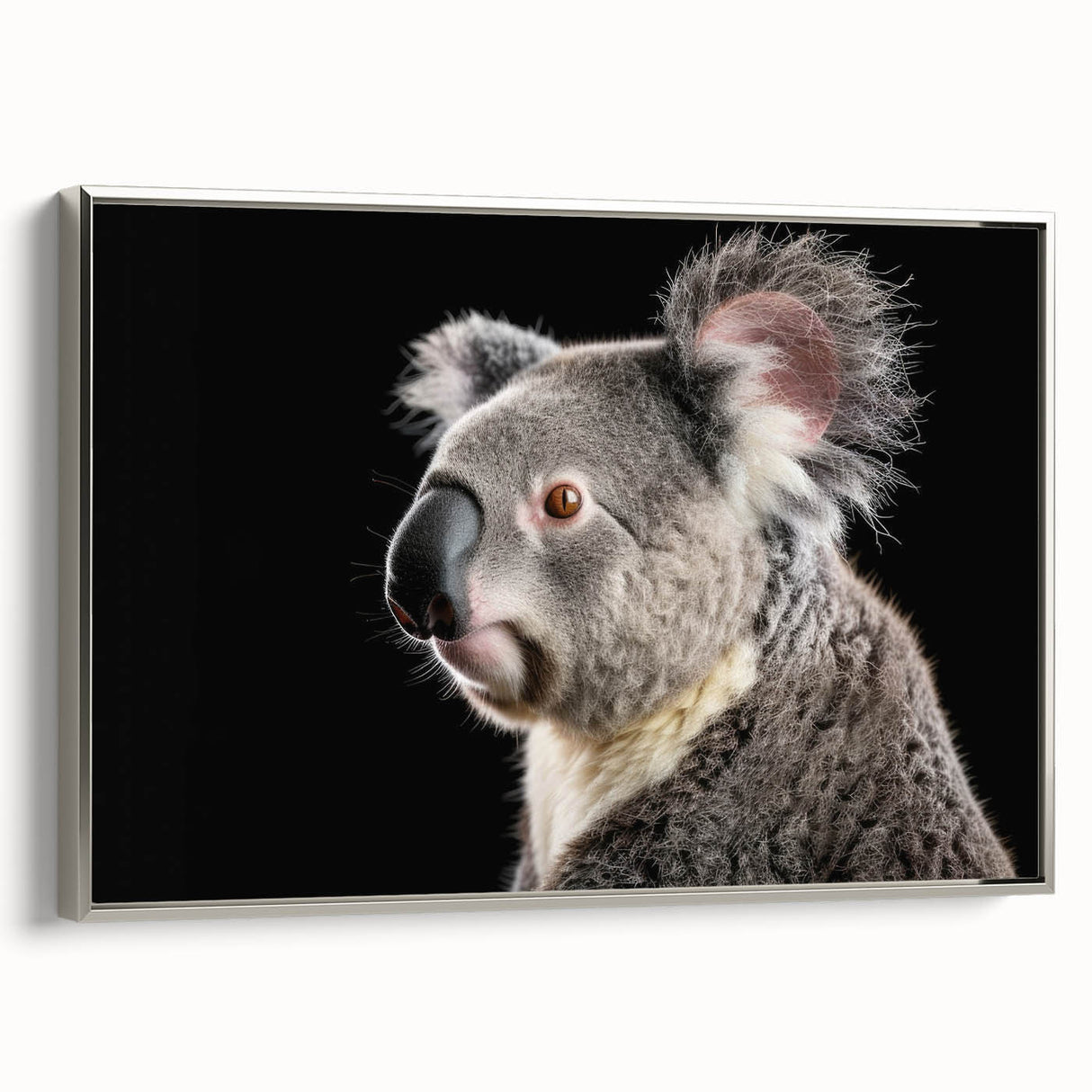 Framed canvas wall art featuring a serene koala design in a silver frame, showcasing vibrant colors and intricate details, perfect for animal lovers and home decor enthusiasts.