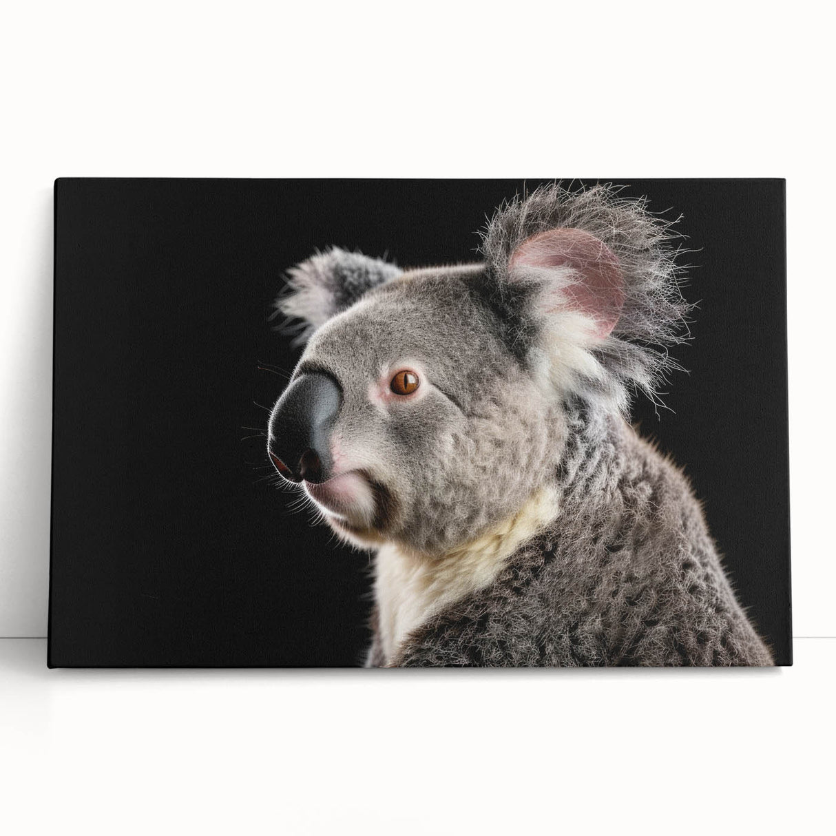 Koala-themed wall art collection featuring a vibrant, stretched canvas design showcasing a detailed illustration of a koala amidst eucalyptus leaves, perfect for animal lovers. The artwork adds a whimsical touch to any room decor.