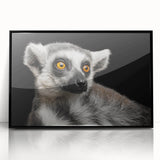 Framed wall art featuring a vibrant lemur design in a black frame, showcasing a colorful and whimsical jungle scene, perfect for animal lovers and home decor enthusiasts.