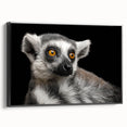 Framed canvas wall art featuring a vibrant lemur design, showcasing intricate details and bold colors, set against a sleek black frame for modern decor.