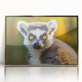 Framed wall art featuring a vibrant lemur design with intricate details, set in an elegant gold frame, perfect for animal lovers and modern decor enthusiasts.