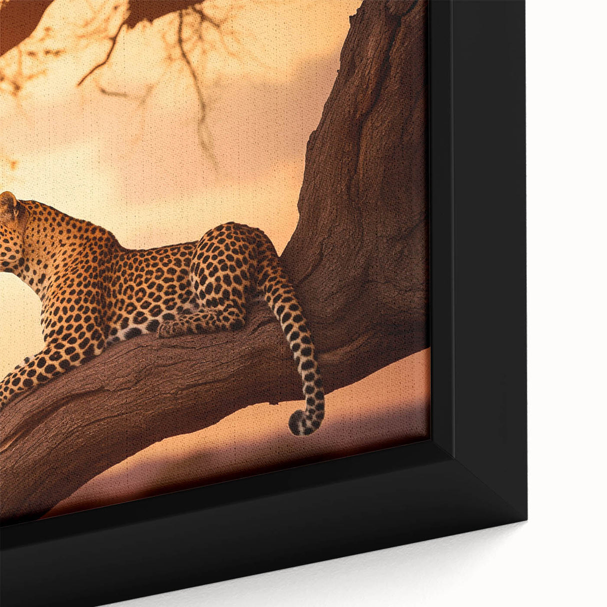 Close-up of a framed canvas wall art featuring a striking leopard design, showcasing vibrant colors and intricate details, perfect for wildlife enthusiasts.
