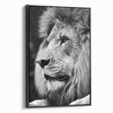 Framed wall art featuring a striking lion design set against a black background, showcasing intricate details and vibrant colors, perfect for enhancing any decor.