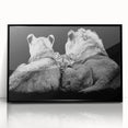 Framed wall art featuring a majestic lion design with vibrant colors and intricate details, set against a sleek black frame, perfect for wildlife enthusiasts.