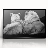 Framed wall art featuring a majestic lion design with vibrant colors and intricate details, set against a sleek black frame, perfect for wildlife enthusiasts.