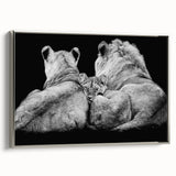 Framed canvas wall art showcasing a majestic lion design in silver, highlighting intricate details and textures, perfect for enhancing interior decor.