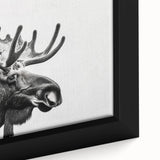 Close-up of a framed canvas wall art depicting a moose and elk in a natural setting, showcasing intricate details and vibrant colors, perfect for wildlife enthusiasts.
