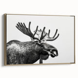 Framed canvas wall art showcasing a stunning moose and elk design in a gold frame, perfect for adding a touch of wildlife elegance to any room.