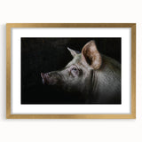 Framed wall art featuring a whimsical design of a pig against a textured background, highlighted with gold accents, perfect for adding charm to any room decor.