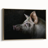 Framed canvas wall art showcasing a whimsical pig design in a vibrant color palette, with a gold frame enhancing its playful aesthetic, perfect for animal lovers.
