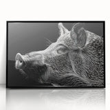 Framed wall art featuring a whimsical pig design in vibrant colors, set against a sleek black background, perfect for adding a playful touch to home decor.