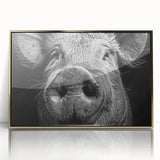 Framed wall art featuring a whimsical pig design with a gold-accented acrylic front, perfect for adding a playful touch to home decor. Ideal for animal lovers and modern interiors.