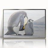 Framed wall art featuring a stylish penguin design in a sleek silver frame, showcasing vibrant colors and a modern aesthetic, perfect for animal lovers' decor.