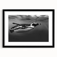 Framed wall art featuring a striking black and white penguin design, set against a textured background, perfect for modern home decor. The black frame enhances the artwork’s elegance, making it an ideal piece for animal lovers and contemporary interiors.