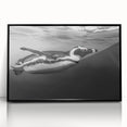 Framed wall art featuring a striking penguin design in a black acrylic frame, showcasing vibrant colors and intricate details that enhance any modern decor.