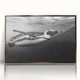 Framed acrylic wall art featuring a striking penguin design with a gold border, showcasing a vibrant wildlife theme perfect for modern decor.